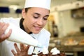 Young pastry cook at work Royalty Free Stock Photo