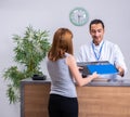 Young patient at the reception in the hospital Royalty Free Stock Photo