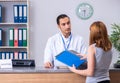 Young patient at the reception in the hospital Royalty Free Stock Photo