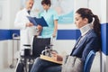 Young patient in the waiting room at the hospital Royalty Free Stock Photo