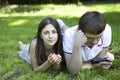 Young pensive couple lying