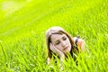 Young pensive on the grass