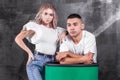 Young beautiful blonde girl posing with her boyfriend Royalty Free Stock Photo