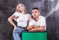 Young beautiful blonde girl posing with her boyfriend Royalty Free Stock Photo