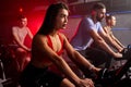 young people biking in spinning class at modern gym Royalty Free Stock Photo