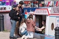 Young people buying slush and ice cream during British summer