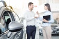 Young People in a Car Rental Service Transportation Concept Royalty Free Stock Photo