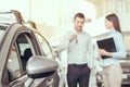 Young People in a Car Rental Service Transportation Concept Royalty Free Stock Photo