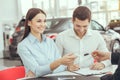 Young People in a Car Rental Service Transportation Concept Royalty Free Stock Photo