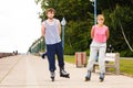 Young people casually rollblading together.