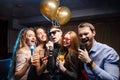 Young people celebrating birthday in karaoke bar Royalty Free Stock Photo