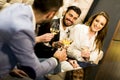 Young people celebrating and toasting with white wine Royalty Free Stock Photo