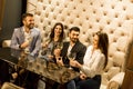 Young people celebrating and toasting with white wine Royalty Free Stock Photo