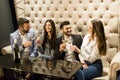 Young people celebrating and toasting with white wine Royalty Free Stock Photo