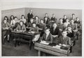 Young people classmates teacher classroom Vintage photo Royalty Free Stock Photo