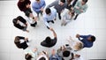 Young people in the conference room communicate top view