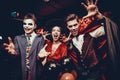 Young People in Costumes Celebrating Halloween