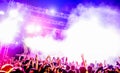 Young people dancing and having fun in summer festival party outdoor - Crowd with hands up celebrating concert event - Soft focus Royalty Free Stock Photo