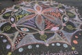 Young people drawing mandala for love and peace in the streets of Caracas during Venezuela blackout