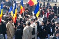 Alba Iulia, Romania - 01.12.2018: Young people dressed in traditional clothing and carrying Romanian flags