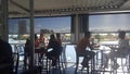 Young people enjoying a drink before sunset at the Helm Bar, Surfers Paradise, Queensland