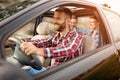 Young people enjoying a road trip in the car Royalty Free Stock Photo