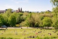 Young people enjoying a warm sunny day in Kelvingrove park of Glasgow