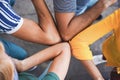 Young people friends bump their elbows instead of greeting with a hug - Avoid the spread of coronavirus, social distance and