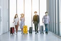 Young people group in Airport Lounge waiting departure and happy smile at airport Royalty Free Stock Photo