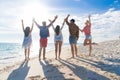 Young People Group On Beach Summer Vacation, Raised Hands Friends Seaside