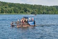 Young people have fun on a rented float near Berlin