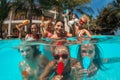 Young people having fun in tropical vacation - Holiday, youth lifestyle and friend