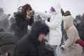 Young people having snowball fight Royalty Free Stock Photo