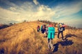 Young people are hiking in mountains