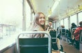 Young people inside old style tram - Happy passengers having fun inside bus - Focus on woman face - Transportation, travel and Royalty Free Stock Photo