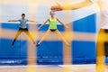 Young people jumping on trampolines