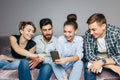 Young people are laughing while surfung the Internet Royalty Free Stock Photo