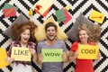 Young people lying on carpet and laughing Royalty Free Stock Photo