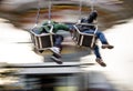 Young people on Merry Go Round at Lunapark Royalty Free Stock Photo