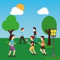 Young people in park man girls walking, men playing ball Royalty Free Stock Photo