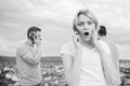 3 young people on phone. Friends and smartphone. Beautiful young Royalty Free Stock Photo