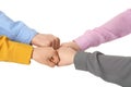 Young people putting their hands together on white background Royalty Free Stock Photo