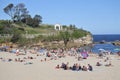Young people relaxing on Coogee Beach in Sydney New South Wales Australia