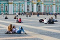 Young people rest on Palace Square, St. Petersburg, Russia Royalty Free Stock Photo