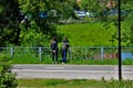 Young people on the river bank. Russia.