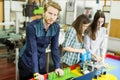 Young people in the robotics classroom Royalty Free Stock Photo