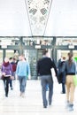 Young People Rushing through Corridor, Motion Blur Royalty Free Stock Photo