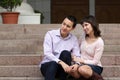 Young people sitting on the steps