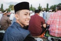 Young people smile happily at Eid prayer Royalty Free Stock Photo