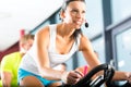 Young People Spinning in the fitness gym Royalty Free Stock Photo